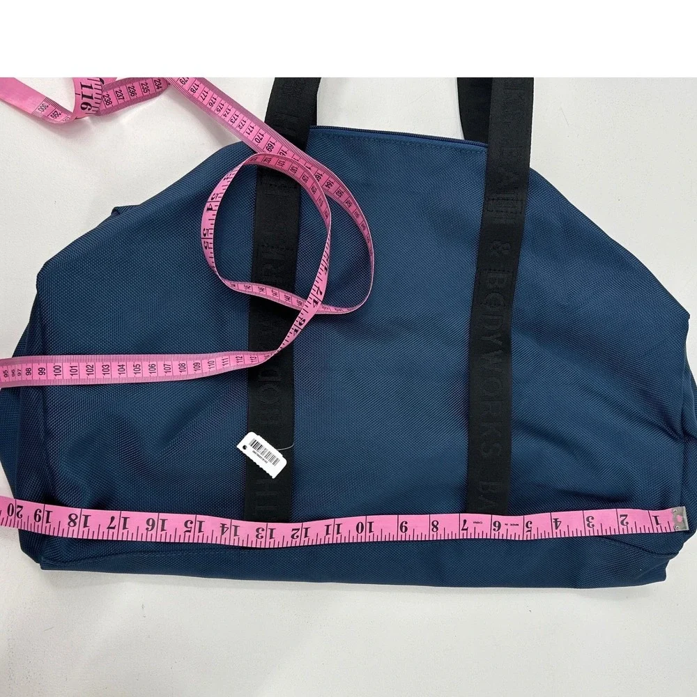 Bath & Body Works Navy Blue Duffel Bag Logo Strap Weekender Travel Gym Bag NEW